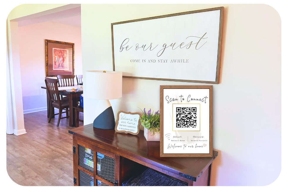 QR Code Airbnb WiFi sign displayed framed on an entryway table